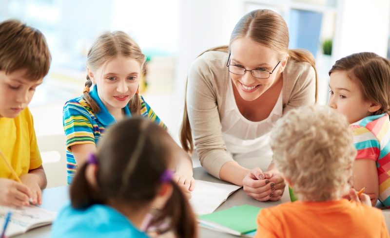 Small group with teacher listening