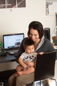 Mom balances work-life with baby.